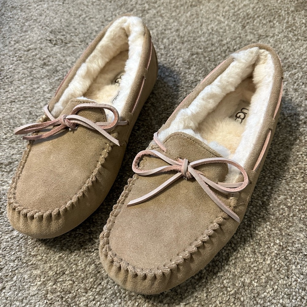 I’m selling chestnut brown with pink outlining UGG Moccasins in a size 8 women’s
